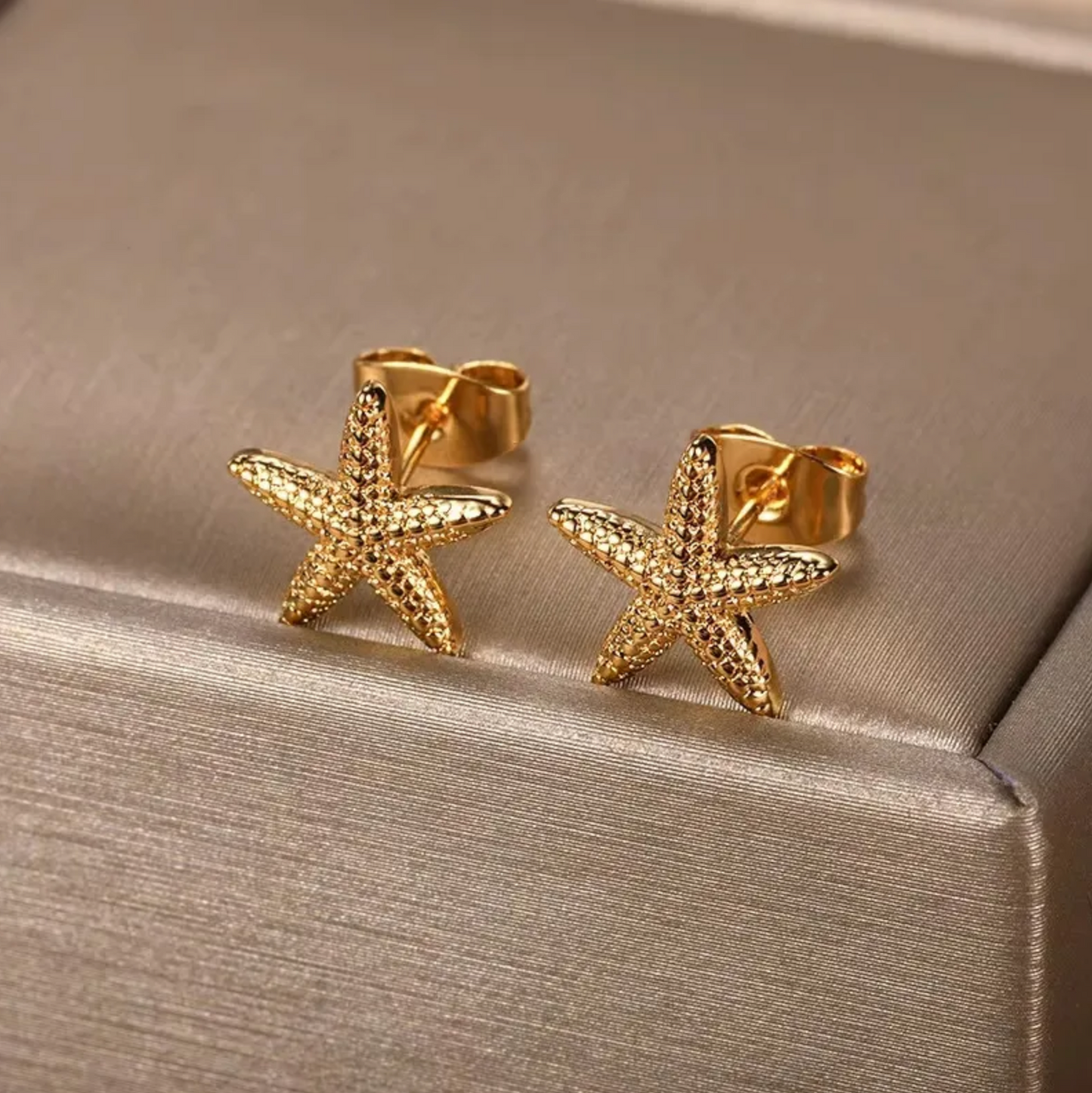 Aretes estrella de mar acero inoxidable