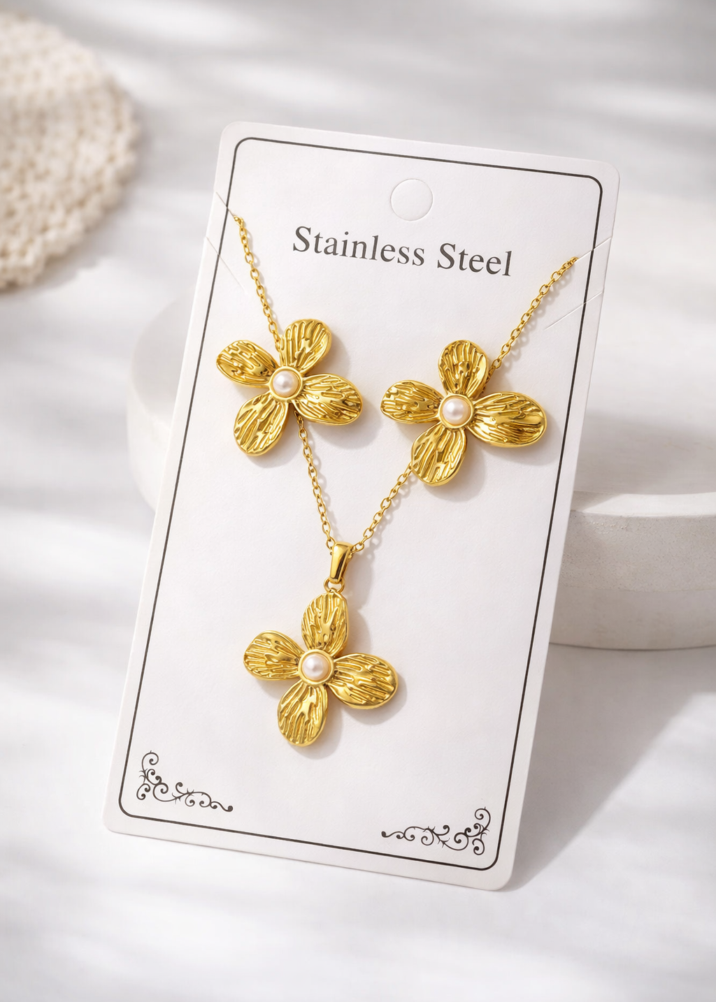 Conjunto flores y perlas acero inoxidable