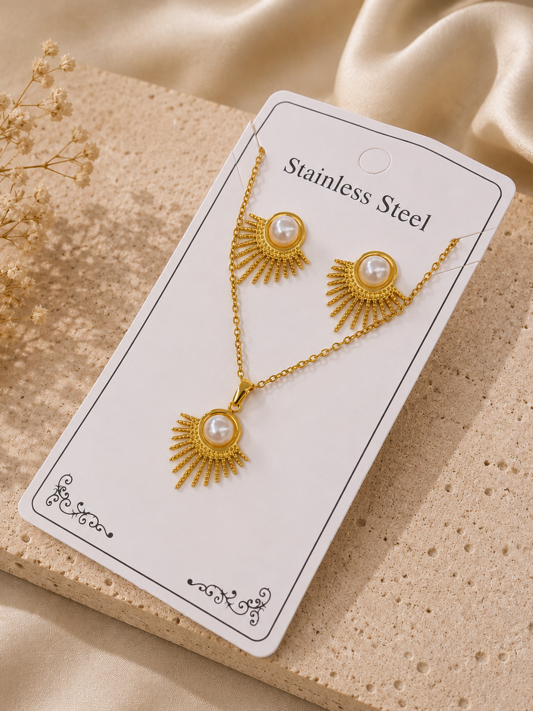 Conjunto sol con perla acero inoxidable