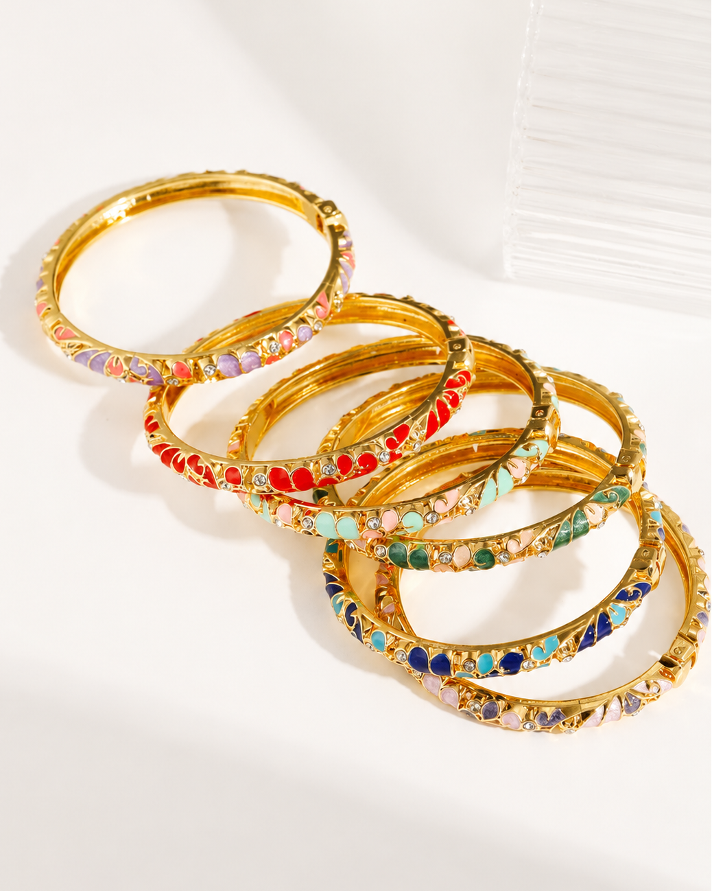Brazaletes tipo bangle esmaltados bañado en oro