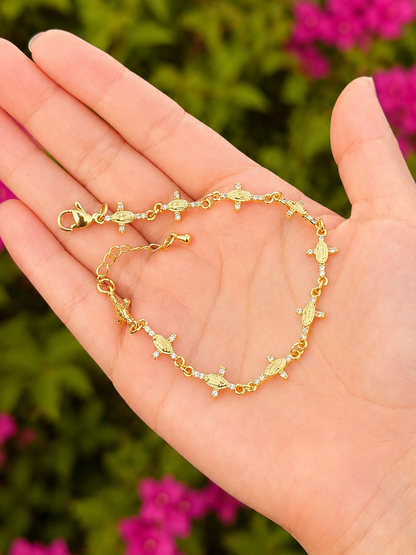 Pulsera virgen en cruces con zirconias chapa de oro
