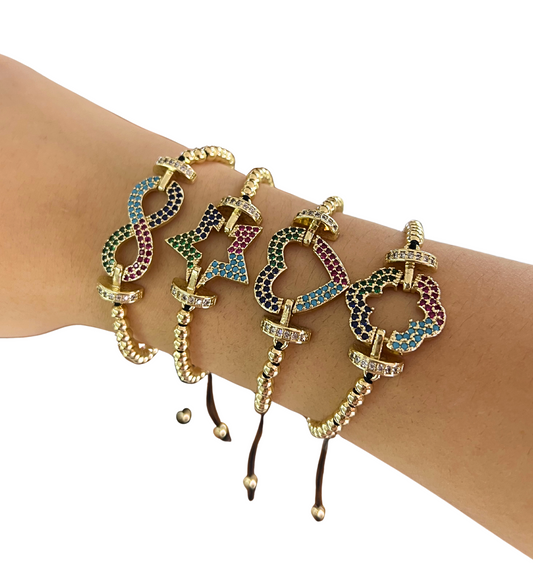 Pulsera de oro laminado con figuras ajustables de hilo