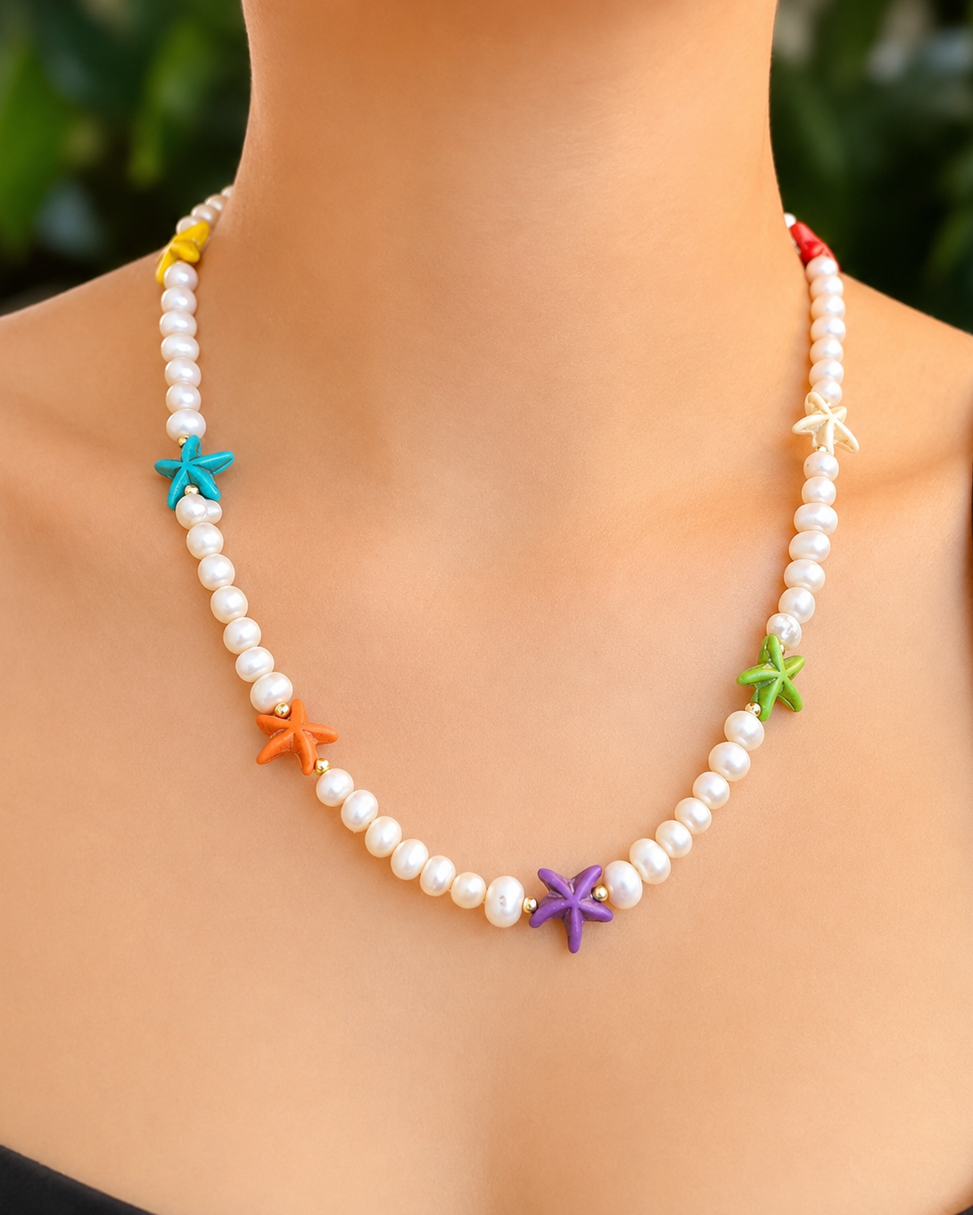 Collar de perlas naturales con estrellas de mar