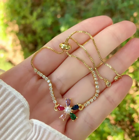 Pulsera flor arcoíris con perla ajustable chapa de oro