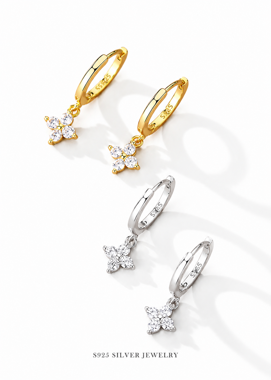 Aretes huggies trébol con circón plata 925