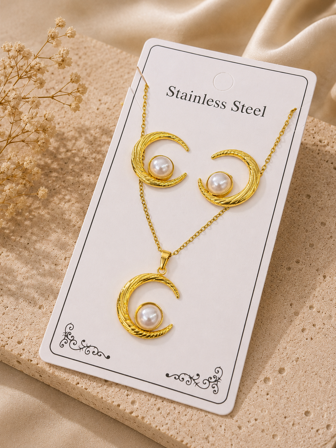 Conjunto media luna con perla acero inoxidable