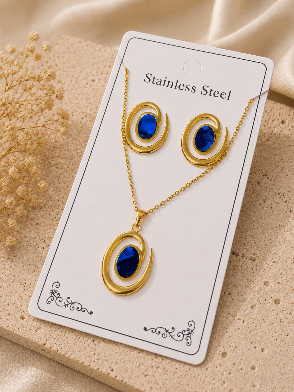 Conjunto óvalo abierto con cristal azul acero inoxidable