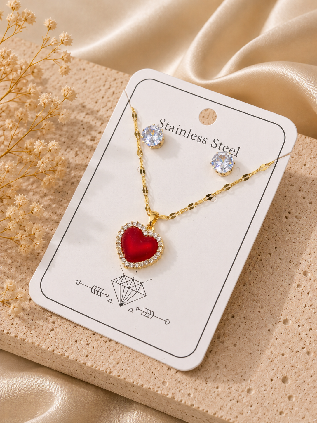 Conjunto corazón reina roja acero inoxidable