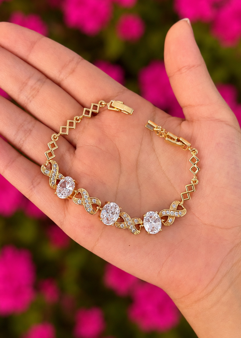 Pulsera infinitos con zirconias ovaladas chapa de oro
