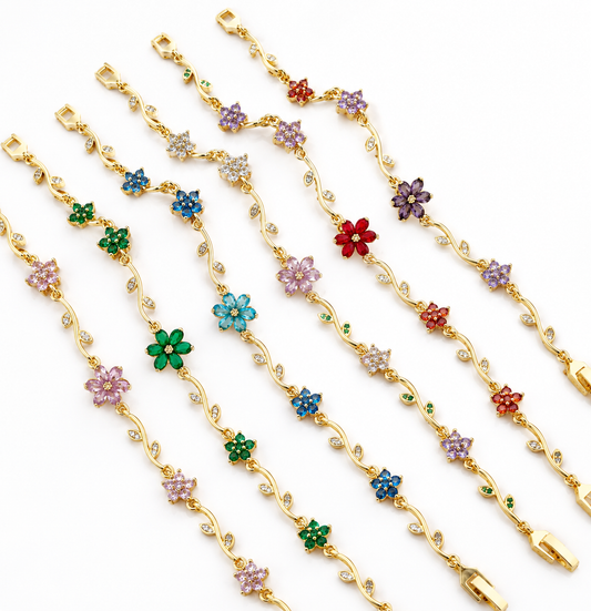 Pulsera de eslabones floral con zirconias chapa de oro 18k