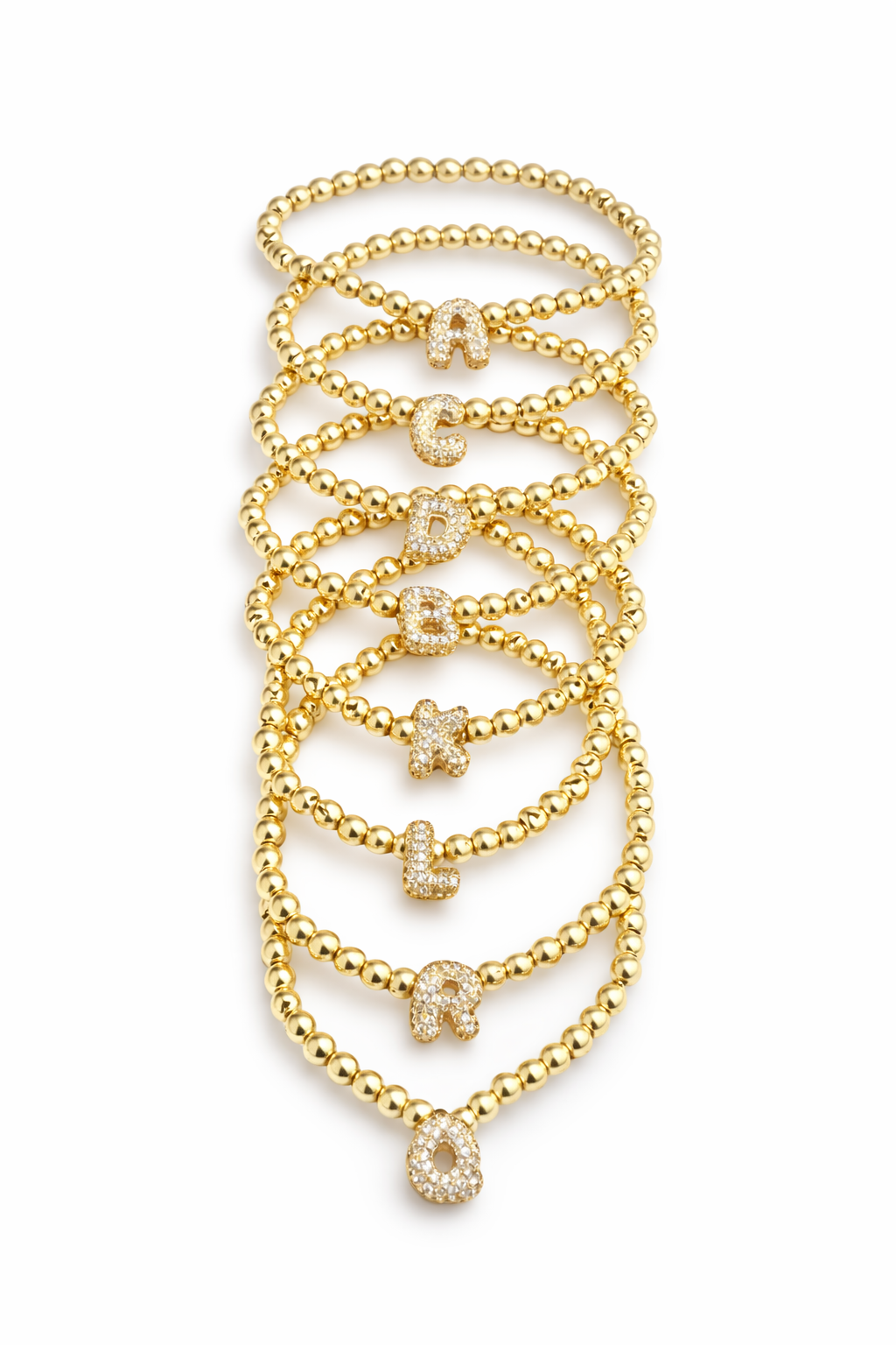 Pulsera elástica inicial con zirconias y hematitas