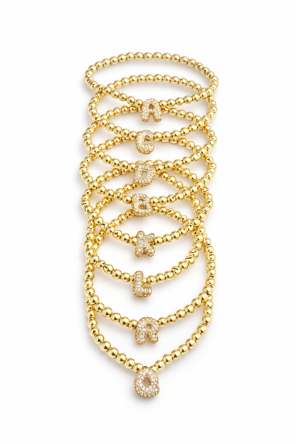 Pulsera elástica inicial con zirconias y hematitas