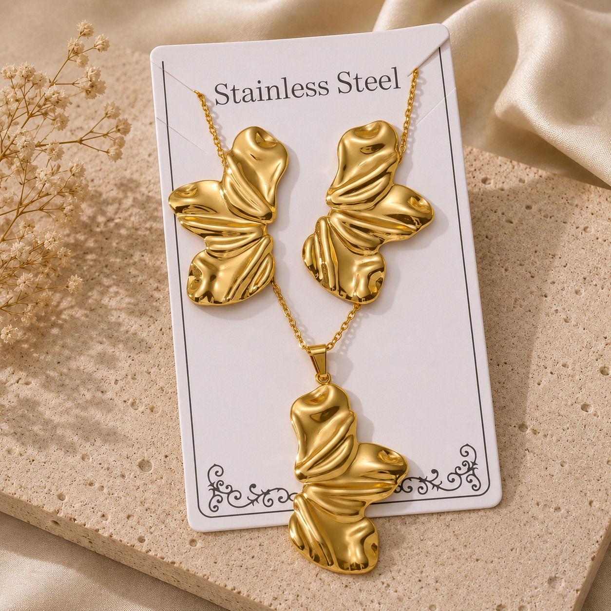 Conjunto abstracto dorado acero inoxidable