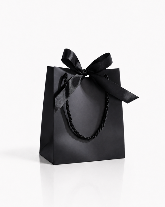 Bolsa de regalo de papel negra con listón negro