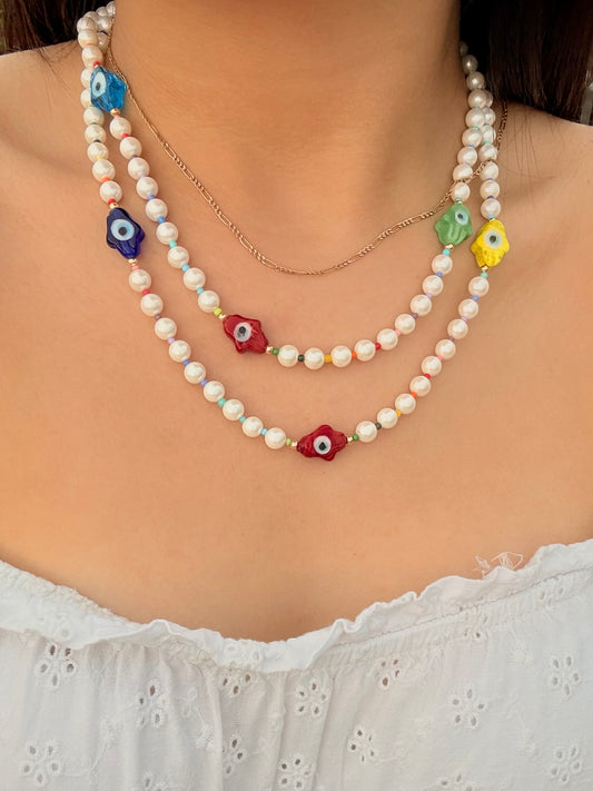 Collares perlas naturales con dijes de cerámica