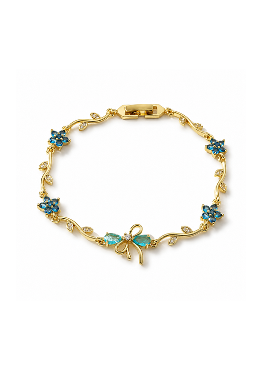 Pulsera de eslabones floral con moño chapa de oro 18k